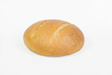 Fresh bakery product. Bread. White round wheat bread isolated on white background. Top view and copy space for text.