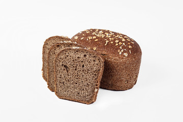 Fresh bakery product. Bread. Cereal bun with bran, sunflower and flax seeds isolated on white background. Top view and copy space for text.