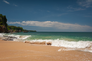 Beach and beautiful views of the cliffs, splashing waves and nature.