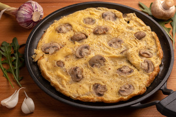 frittata (scrambled eggs) with mushrooms