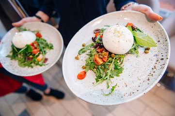 Italian burrata cheese with salad
