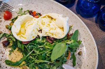 Italian burrata cheese with salad