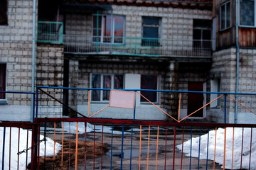 a lone building with an empty sign