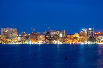 Halifax City skyline at night from Dartmouth waterfront, Nova Scotia NS, Canada.