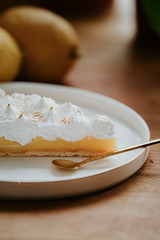 Lemon tart on the counter top, meringue top