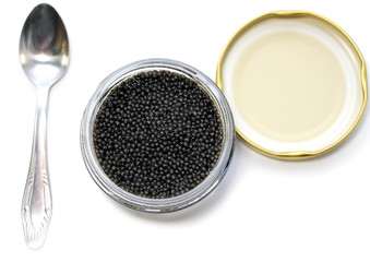 Black sturgeon caviar on a white background.