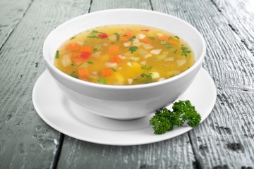 Bowl of delicious vegetable soup on a table