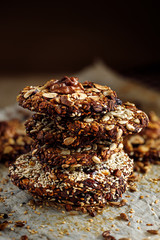 Homemade healthy oatmeal cookies with the addition of honey and mix nuts and dried fruit close up