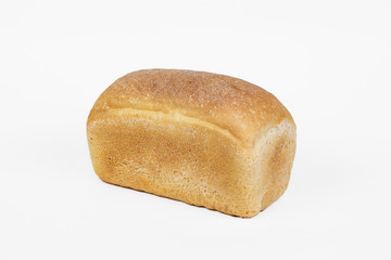 Fresh bakery product. Bread. White Uniform Wheat Bread isolated on white background. Top view and copy space for text.
