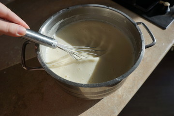 Fototapeta na wymiar Pancake dough on a table in the kitchen