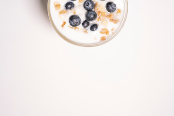 Natural organic breakfast - Greek yogurt with granola and berries. Copyspace for your text