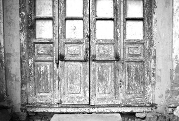 Dramatic closed vintage wooden doors background
