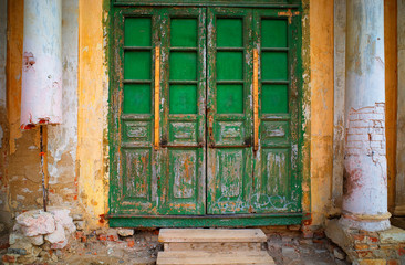 Green closed vintage wooden doors background