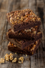 Brownie tower with chocolate sauce on the table