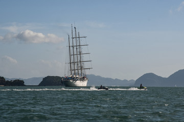 Island Hopping in Langkawi. Family vacation and tours Malaysia. Scenic view of ship on background...