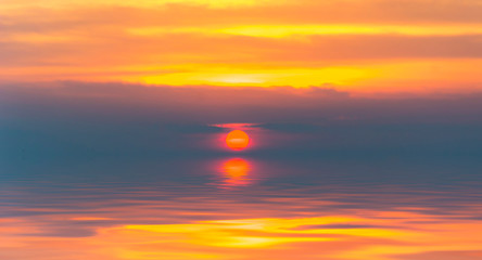 Sunset with slow shutter and bot silhouette