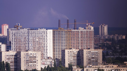 Pipes smoke, polluting the air in the city, worsening the environment