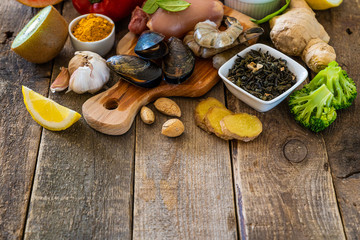 Selection of food to boost immune system - healthy, rich in vitamin and antioxidants, copy space