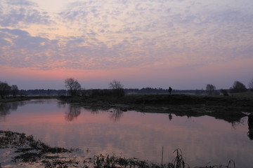 Colourful morning over the river flood