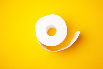 Roll of toilet paper on a yellow background. Flat style. Coronavirus concept. Stay at home