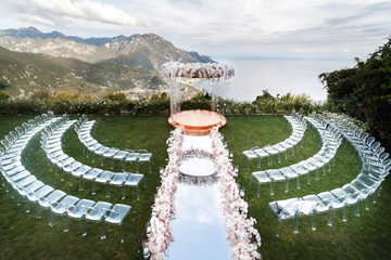 A marvelous place in the decorations and flowers for the wedding ceremony. With transparent chairs...