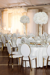 Magnificent table setting for celebrating weddings and other banquets. Wedding decor
