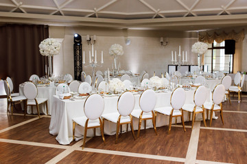 Magnificent table setting for celebrating weddings and other banquets. Wedding decor