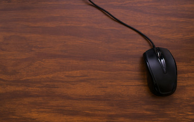 mouse on wood desktop