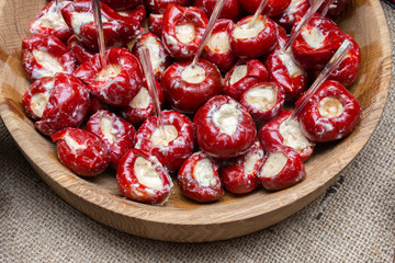 plate of red pepper stuffed with salted cheese