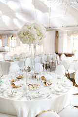 Magnificent table setting for celebrating weddings and other banquets. Wedding decor
