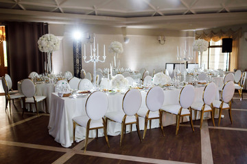 Magnificent table setting for celebrating weddings and other banquets. Wedding decor