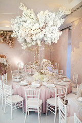 Magnificent table setting for celebrating weddings and other banquets. Wedding decor