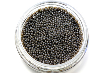 Obraz na płótnie Canvas Black sturgeon caviar on a white background.
