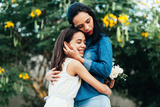 Mothers Day. Happy mother and daughter outdoors