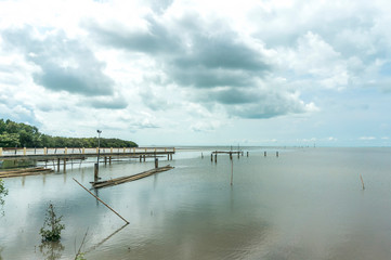 Jetty with grey cloudy skies