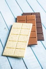White, milk and dark chocolate bars.