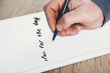 pencil on the open notepad with text stay at home