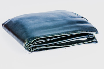 Old used balck leather wallet.