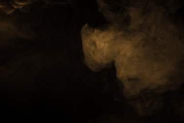 Colorful smoke close-up on a black background