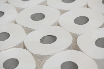 Toilet paper rools stacked on top of each other