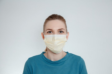 Woman in medical mask. Girl in rubber gloves. Virus protection.