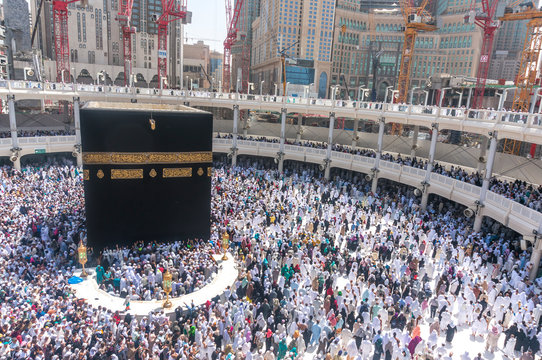 MECCA, SAUDI ARABIA-MAC 09, 2015: WIde angle view of Muslim pilgrims circumambulate the Kaaba counter-clockwise at Masjidil Haram in Makkah, Saudi Arabia..