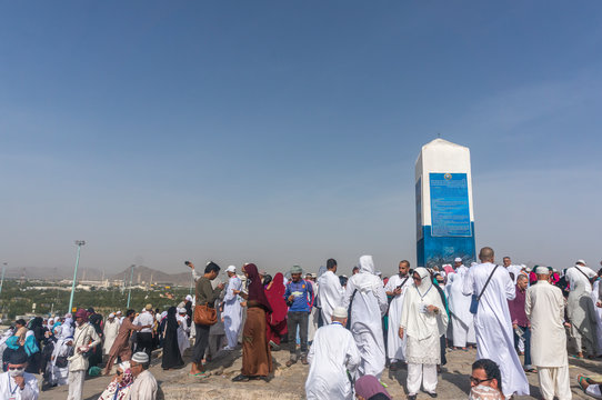 MECCA, SAUDI ARABIA - MAR 11: Muslims at Mount Arafat (or Jabal Rahmah) March 11, 2015 in Arafat, Saudi Arabia. This is the place where Adam and Eve met after being overthrown from heaven..