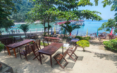 Table and chair at outdoor restorant facing to ocean