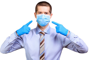 Man in rubber gloves shows on medical mask, in shirt and tie, isolated