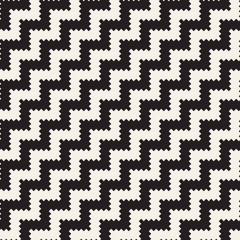 Vector seamless pattern. Abstract geometric background. Stylish ethnic design with zigzag diagonal lines.