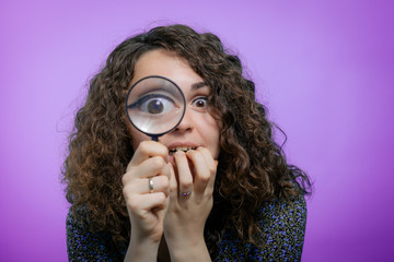 Woman with magnifying glass