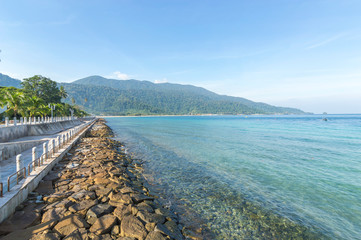 Beach rock with clear water