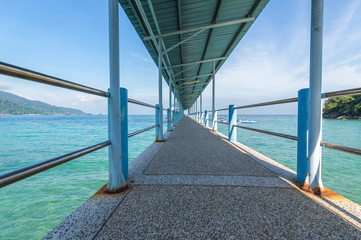 Jetty with green water