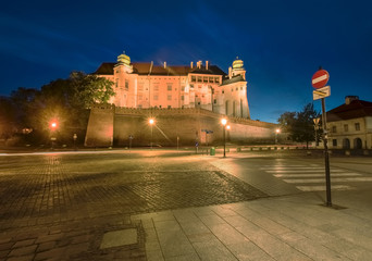 Wawel Royal Castle In Krakow, Poland. The castle was built at the behest of King Casimir III the Great, it consists of a number of structures situated around the Italian-styled main courtyard, Poland